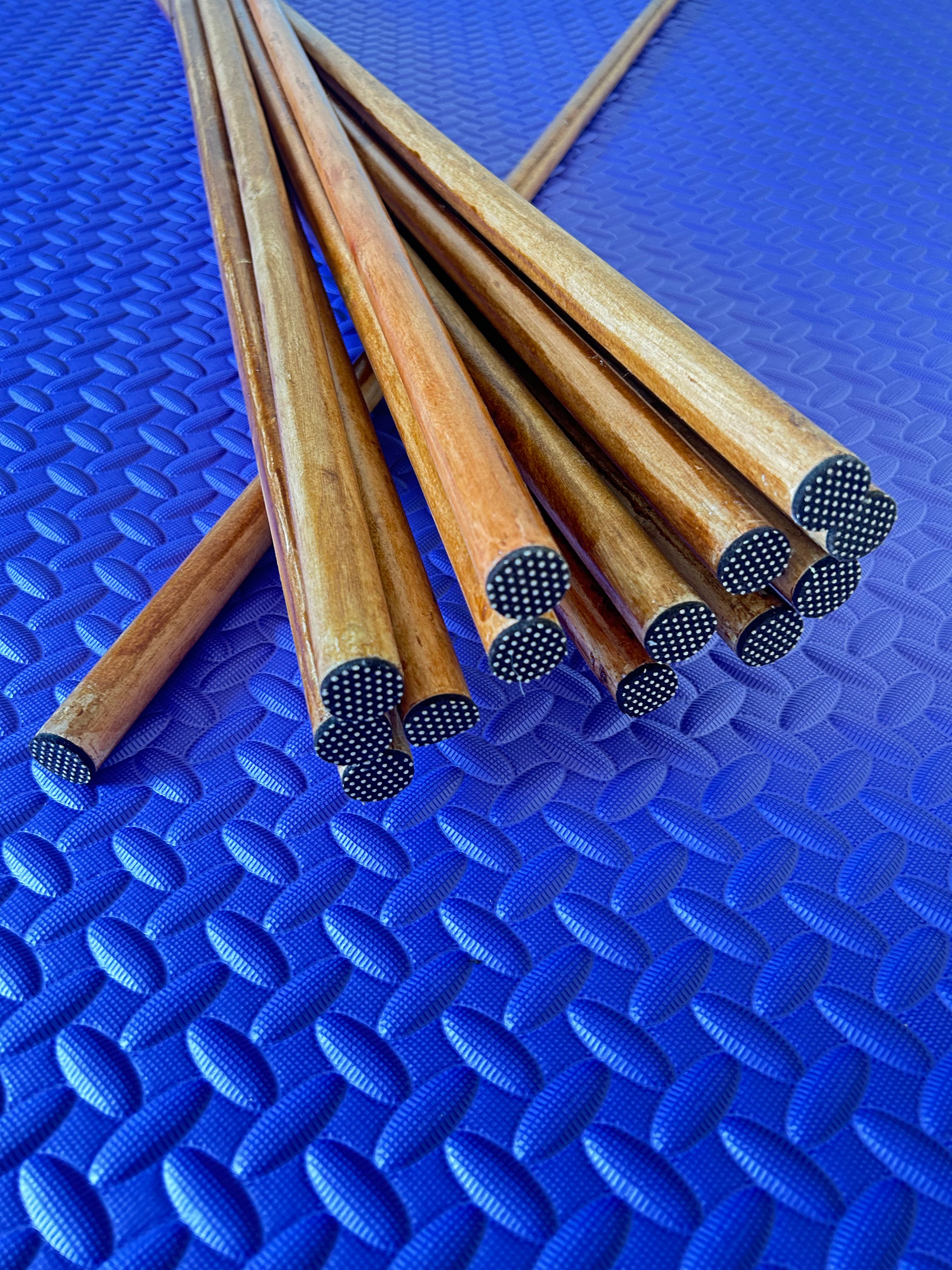 Amortecedor emborrachado para bastão de equilíbrio